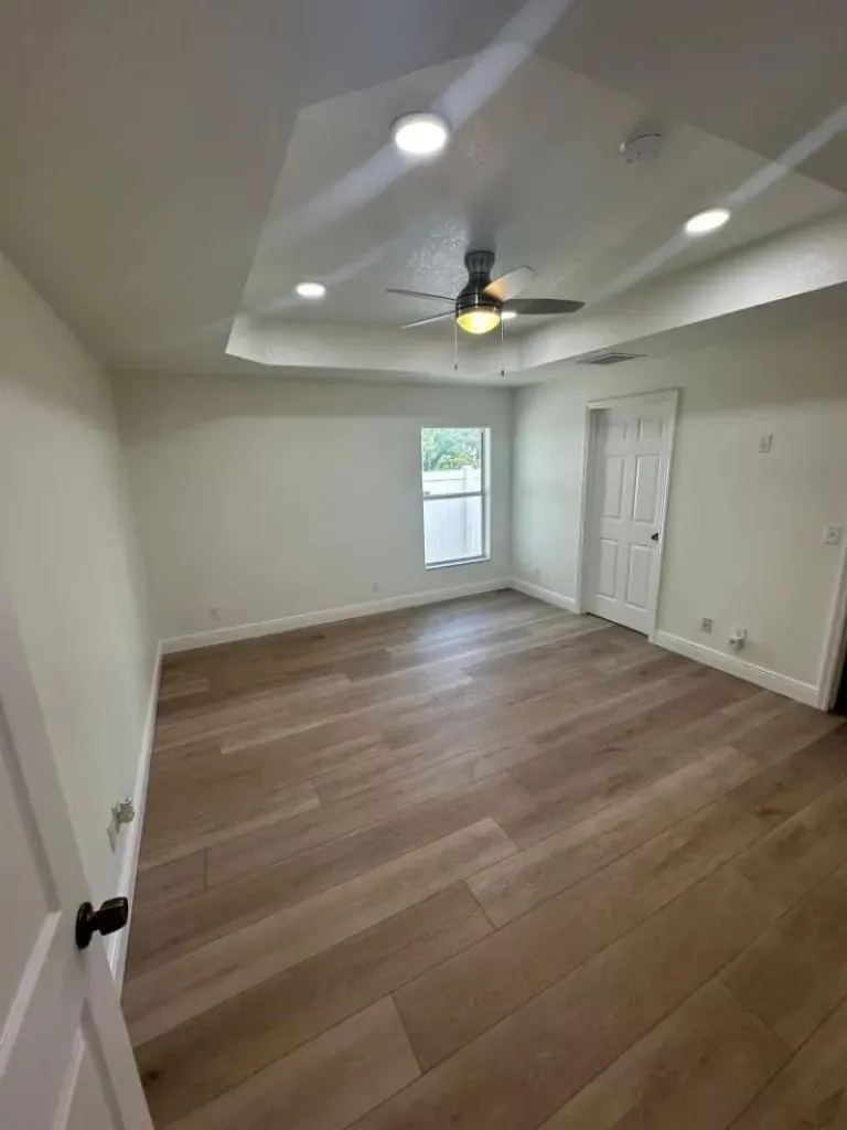 Light oak floor running through a bedroom Light oak floor running through a bedroom
